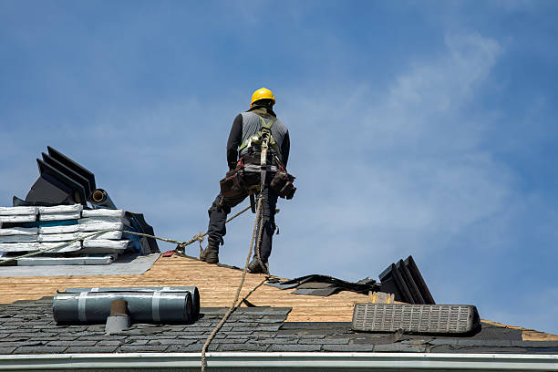 Professional Roofing technician working in Lindenhurst, NY